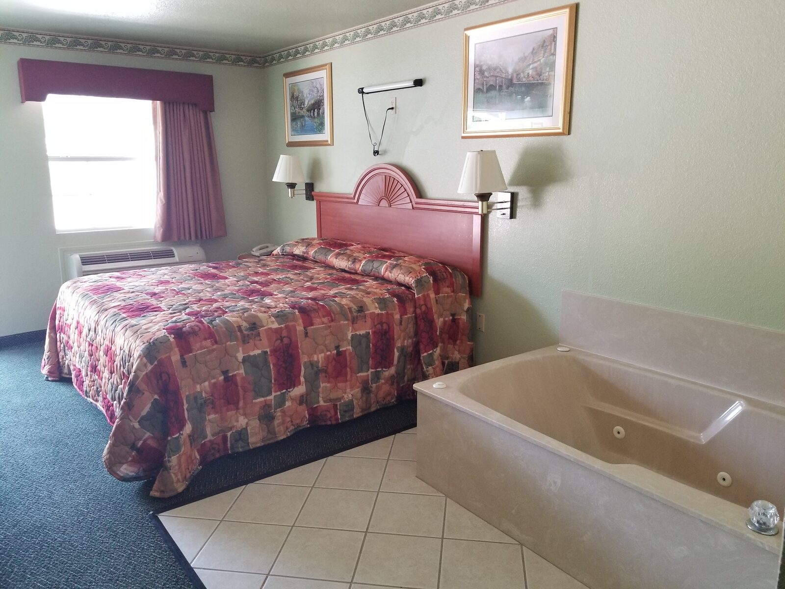 Jacuzzi Suite at Haltom Inn — premium king room with private in-room jetted tub in Haltom City, Texas